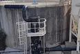 Exterior view of an Aquilair bio with pond